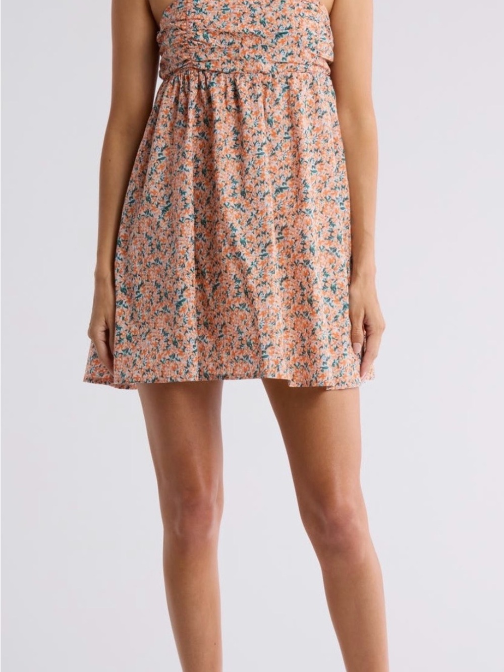 Lush Peach Floral Mini Skirt with Green and Blue Accents